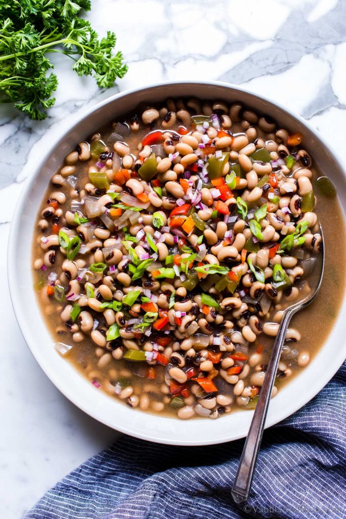 Vegetarian Black Eyed Peas Recipe in a big serving bowl with a spoon. 