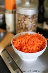 Grated carrots in a small bowl.