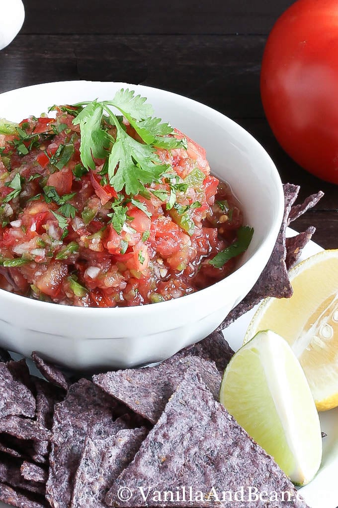 Pico de Gallo in a bowl with chips ready for sharing.