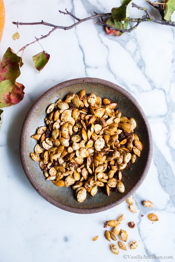 Roasted pumpkin seeds in a bowl. 