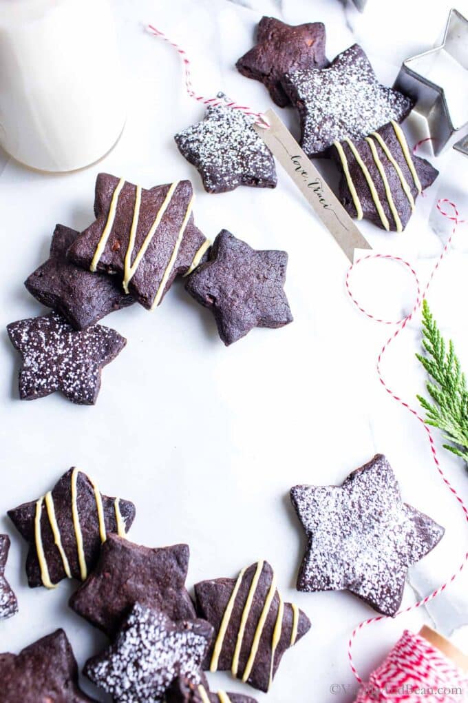 Dark chocolate shortbread cookies cut into stars and decorated.