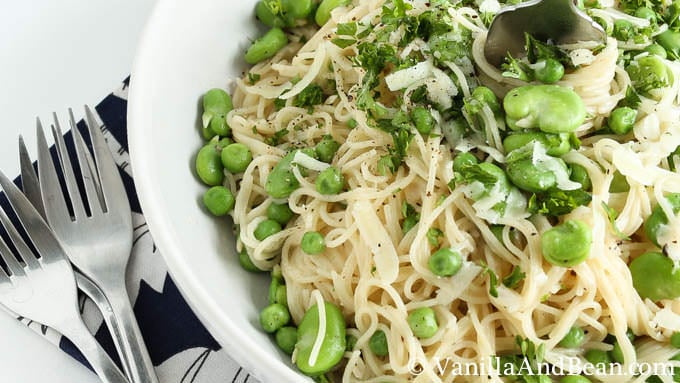 A bowl of capellini with fava beans, peas and pecorino