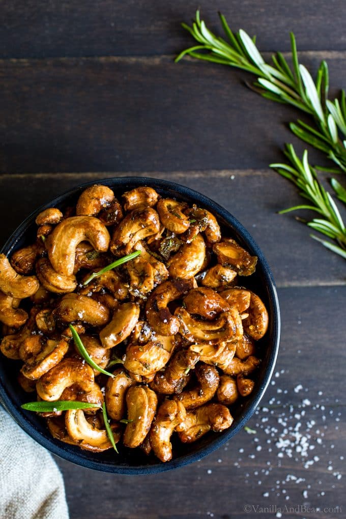 Sweet and Spicy Maple-Roasted Rosemary Cashews in a bowl ready for snacking.