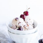 Bourbon Soaked Cherry Vanilla Bean Ice Cream in a bowl ready for sharing.