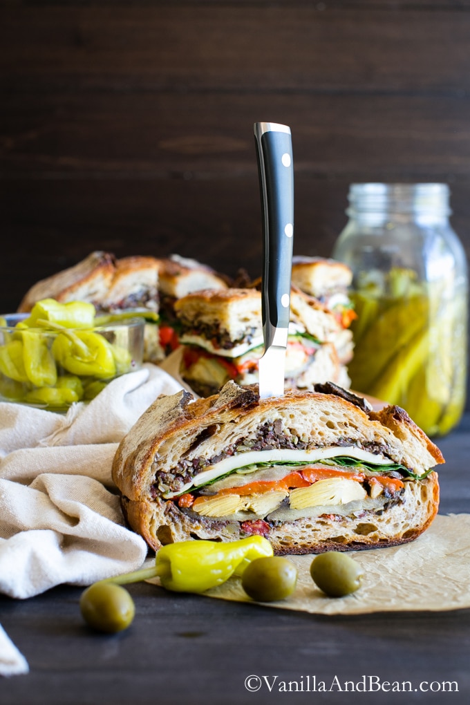 Vegetarian or Vegan, this sandwich is easy to make, feeds a small crowd and packs up for lunches, picnics or tailgating with ease | Italian Pressed Sandwich | Vanilla And Bean
