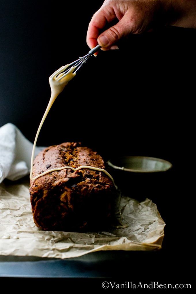 Chocolate and pecan studded vegan pumpkin bread is packed with ingredients like spelt flour, applesauce, coconut oil and a bit of brown sugar, finished with a maple glaze.| Pumpkin Chocolate Pecan Bread | Vanilla And Bean