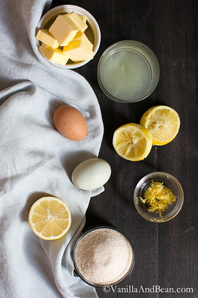Easy Lemon Curd ingredients on a table with a tea towel. 