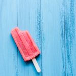 Watermelon Lemon Limeade Popsicle with a bite taken out of it!