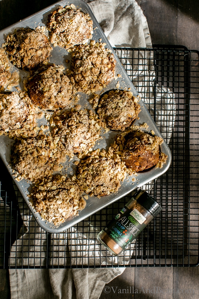 Vegan Apple Gingerbread-Oat Walnut Muffins with Brown Sugar Streusel on a cooling wrack ready to be shared. 