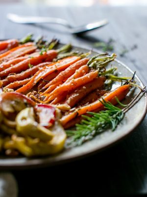 Maple-Roasted Cardamom-Spiced Carrots and Apples on a serving platter.