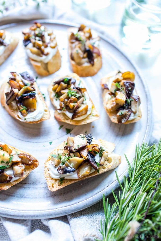 Mushroom Crostini with Whipped Goat Cheese on a plate.