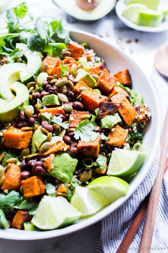 Black Bean Sweet Potato Salad in a bowl with spoons on the side ready to eat.