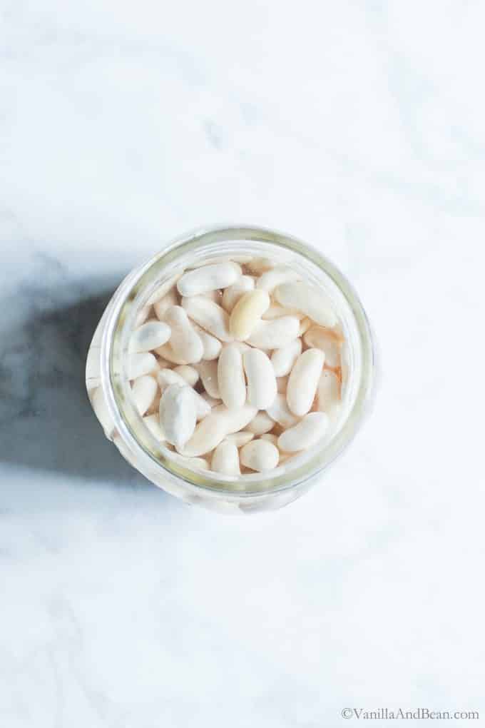 Soaking White Beans in a jar of water. 
