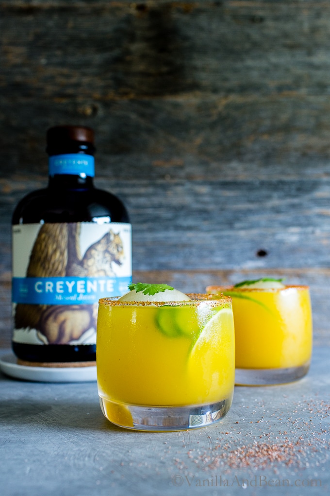 The Mezcal Mango Smash made with Creyente Mezcal in glasses ready for sharing. 