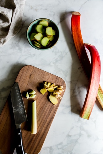 Sliced Lemongrass and Ginger on a cutting board. 
