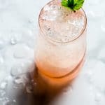 Icy rhubarb soda with a mint garnish.