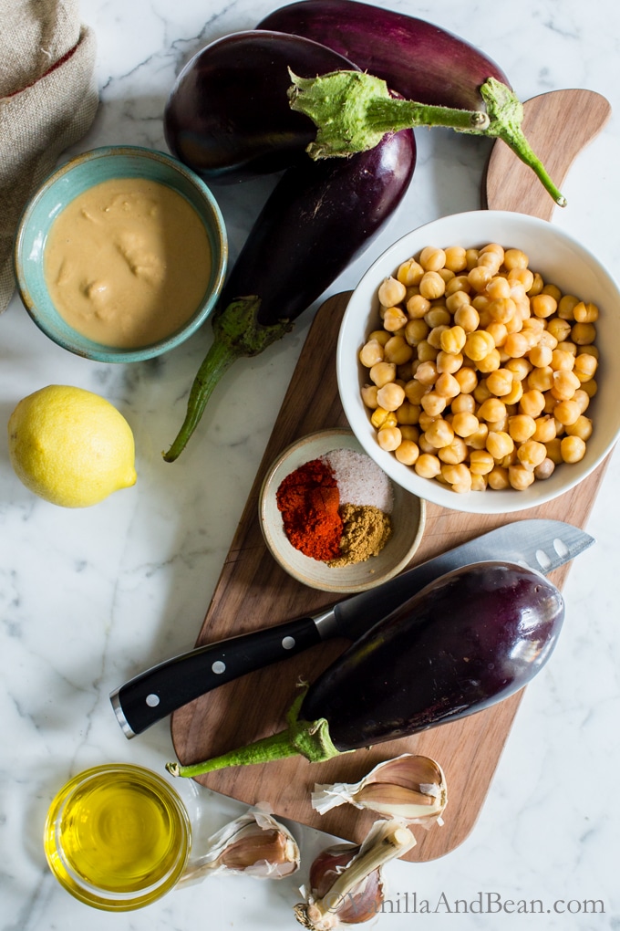 Overhead shot of ingredients for Smoky Roasted Eggplant Hummus.