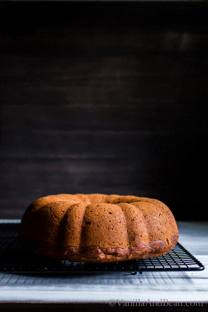 GIF Pumpkin Pecan Bundt Cake with Chocolate Maple Drizzle being poured over the top. 
