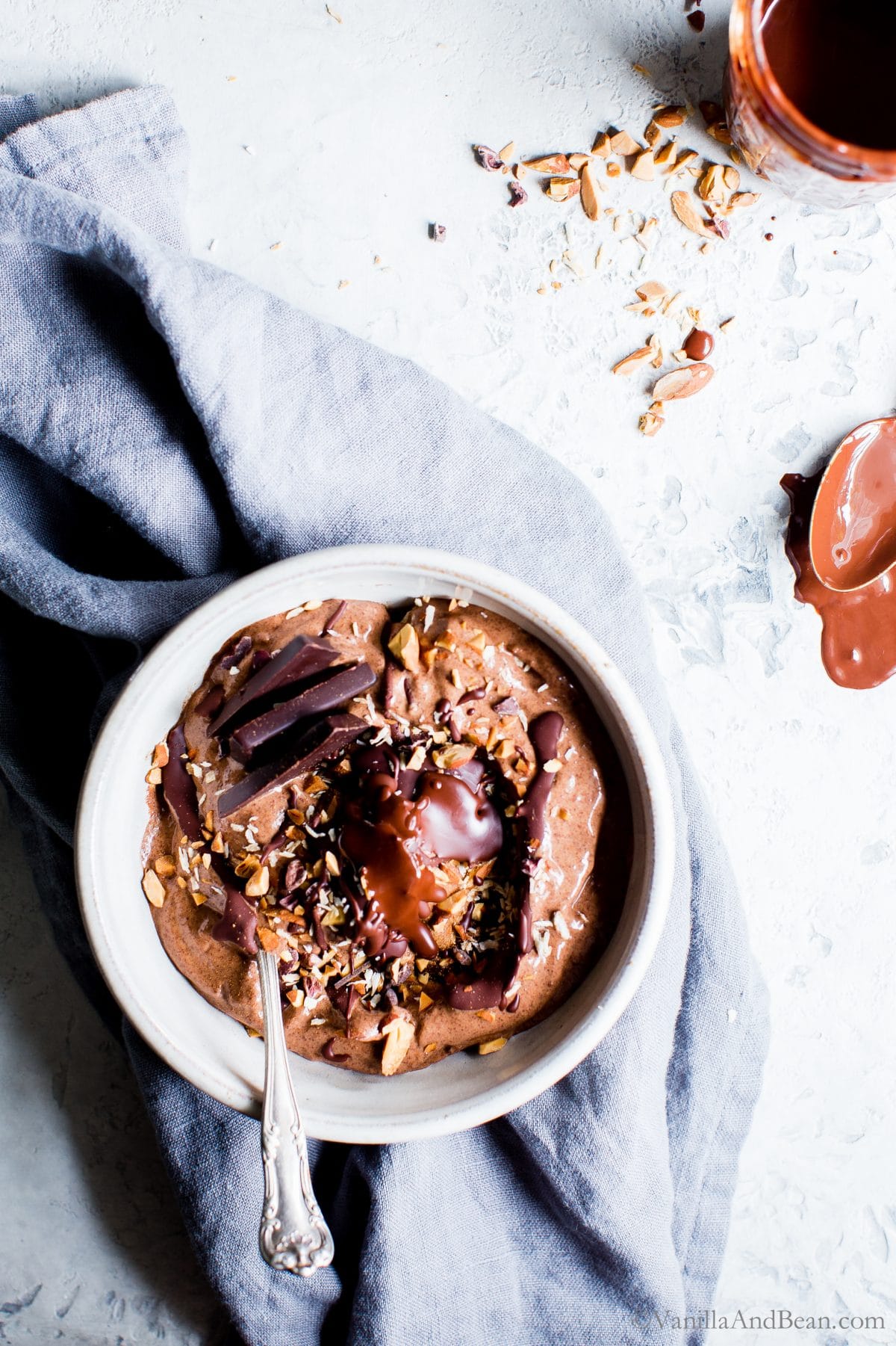 Mexican Chocolate Almond Nice Cream Bowls with a spoon and drizzled with chocolate ready for sharing. 