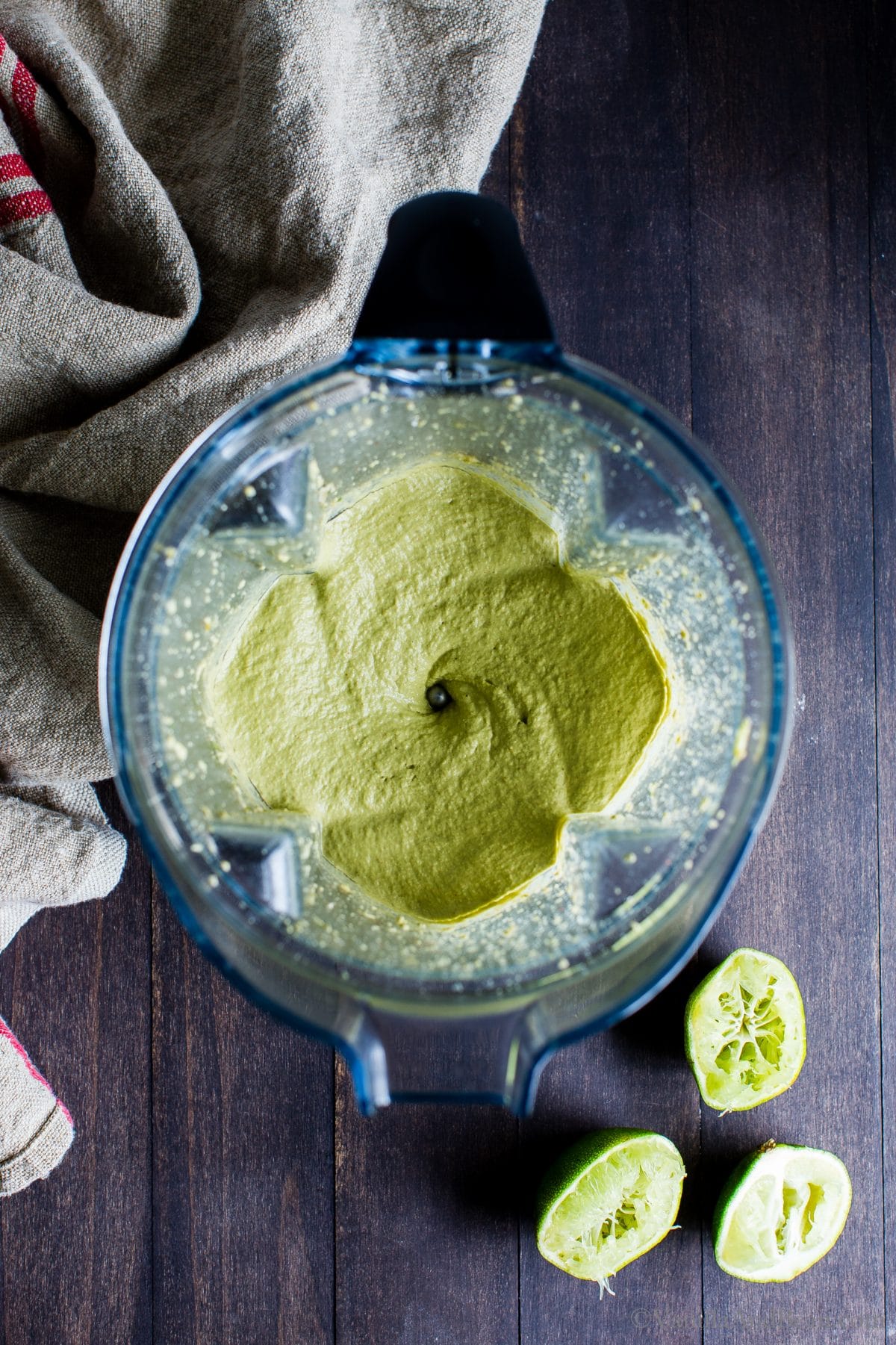 Processed in a high speed blender, Chili-Lime Pepita Crema is ready to be scooped from the blender. 