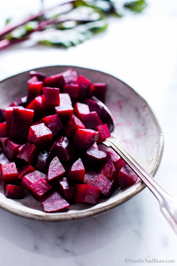 Beets roasted in the oven, then diced and served on a plate.