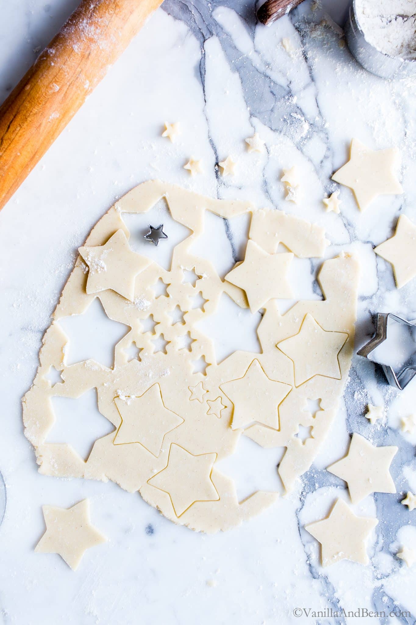 Cutting out pastry stars for pie garnishes. 
