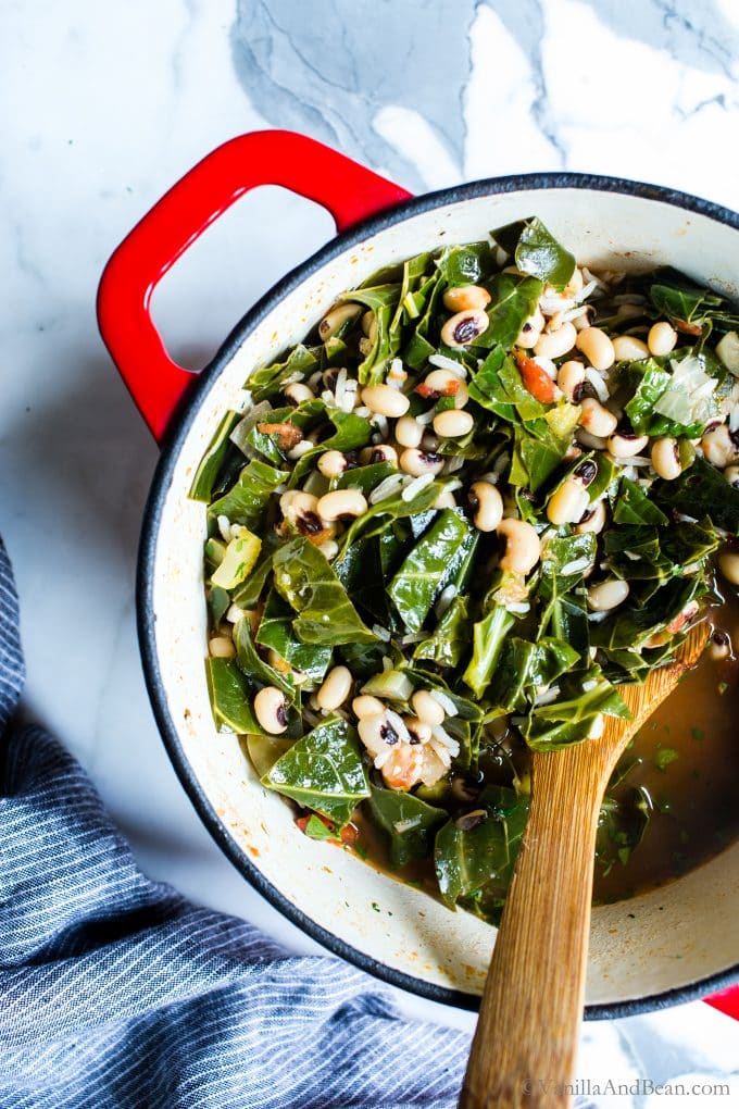 Collard greens, black eyed peas are added to the Dutch oven for this vegetarian Hoppin John Stew.