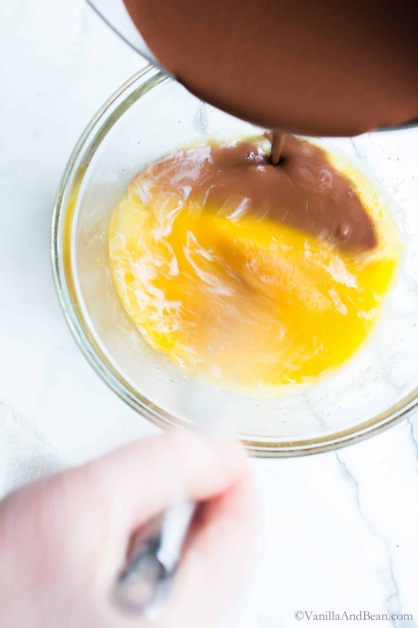 Whisking in the chocolate with the eggs. 