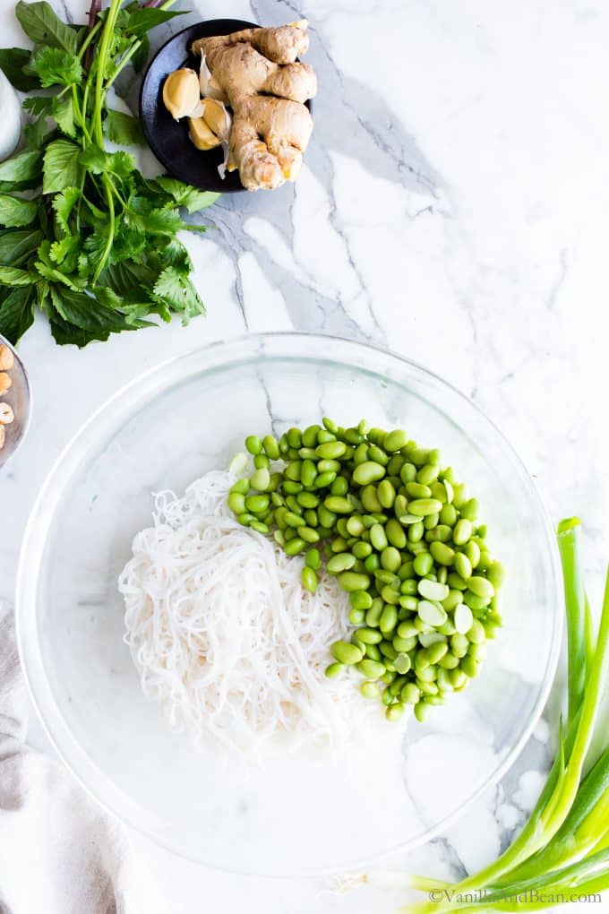 Rice Noodles and Edamame in a large bowl. 