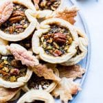 Mini Pecan Pies with No Corn Syrup shared on a serving plate.