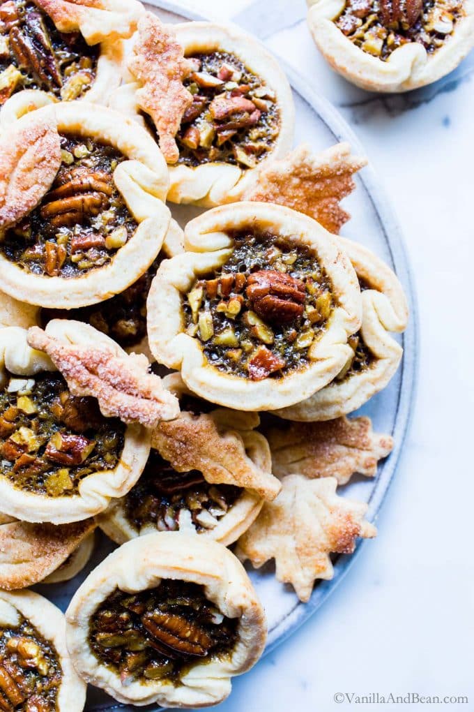 Mini Pecan Pies with No Corn Syrup shared on a serving plate. 