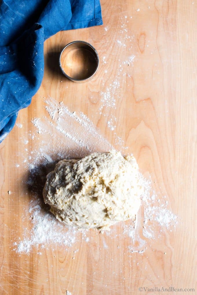 Sourdough biscuit dough on a board. 