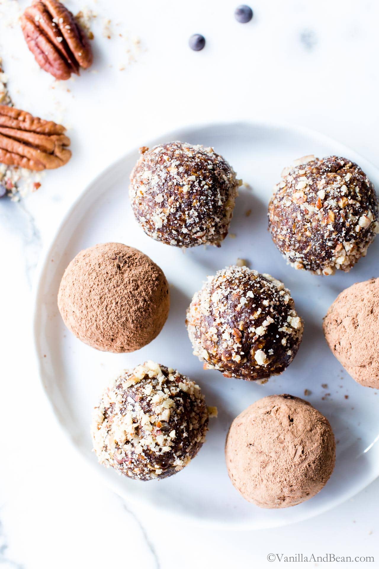 Chocolate Pecan Pie Bliss Balls on a plate.