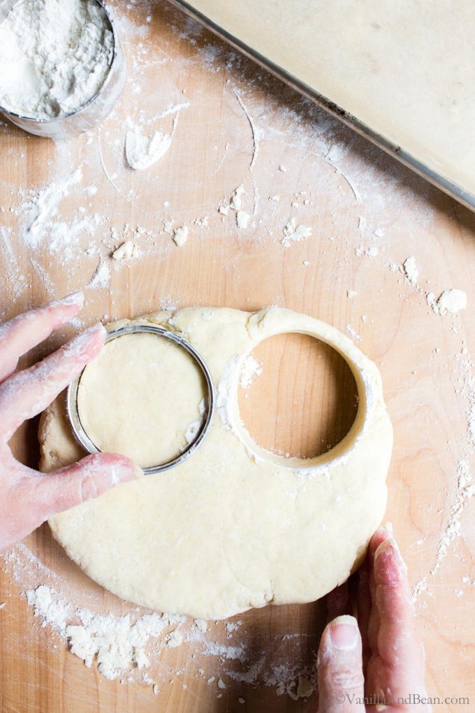 Cutting scones with a biscuit cutter.