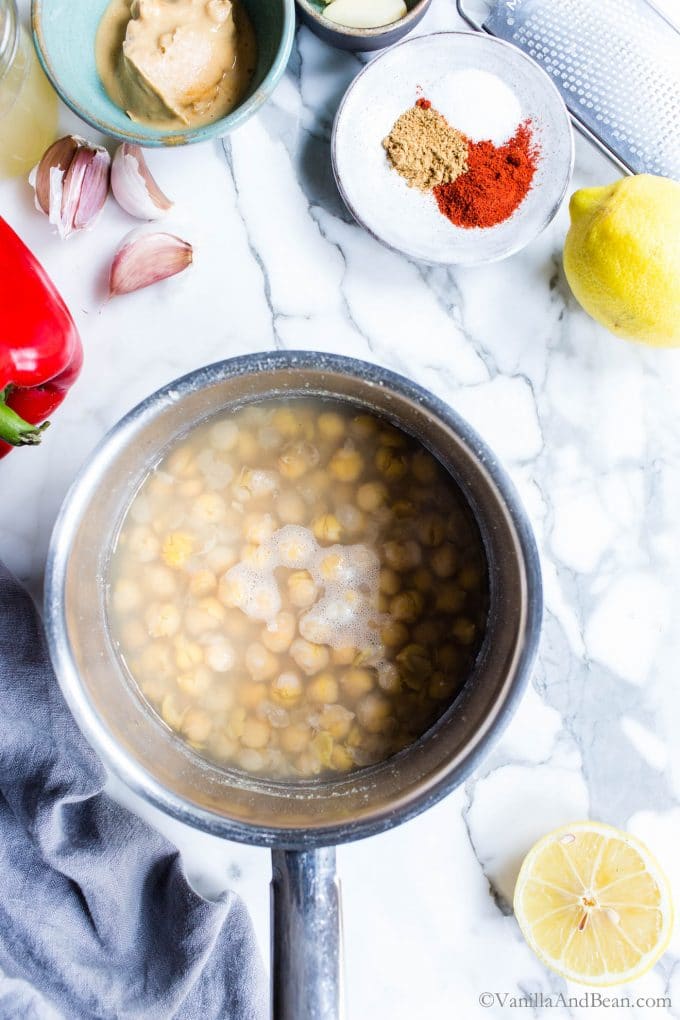 Canned Chickpeas in a sauce pan just having been recooked with baking soda. 