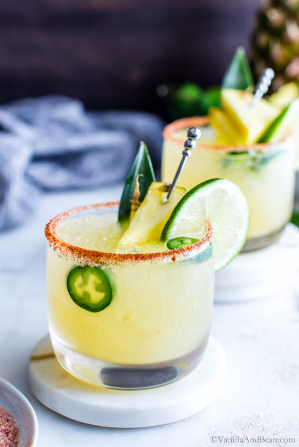 Spicy Margarita close up garnished with lime and jalapeno.