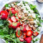 Strawberry Salad with Goat Cheese in a bowl ready for sharing.