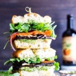 Close up of grilled vegetable sandwich with mozzarella stacked two high.