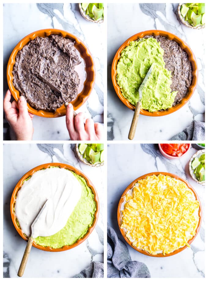 1. A platter with refried black beans being schmeared in it. 2. Guacamole being slathered over the refried black beans. 3. Sour cream being spread over the guacamole. 4. Cheddar cheese over the top of the sour cream on a dip plate.