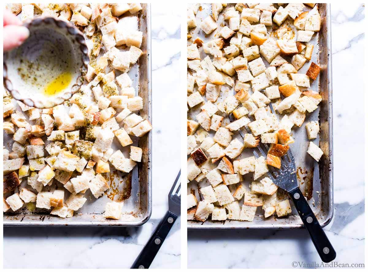 Pouring oil/herb mixture over sourdough bread cubes and mixing the bread cubes on a sheet pan with a spatula.