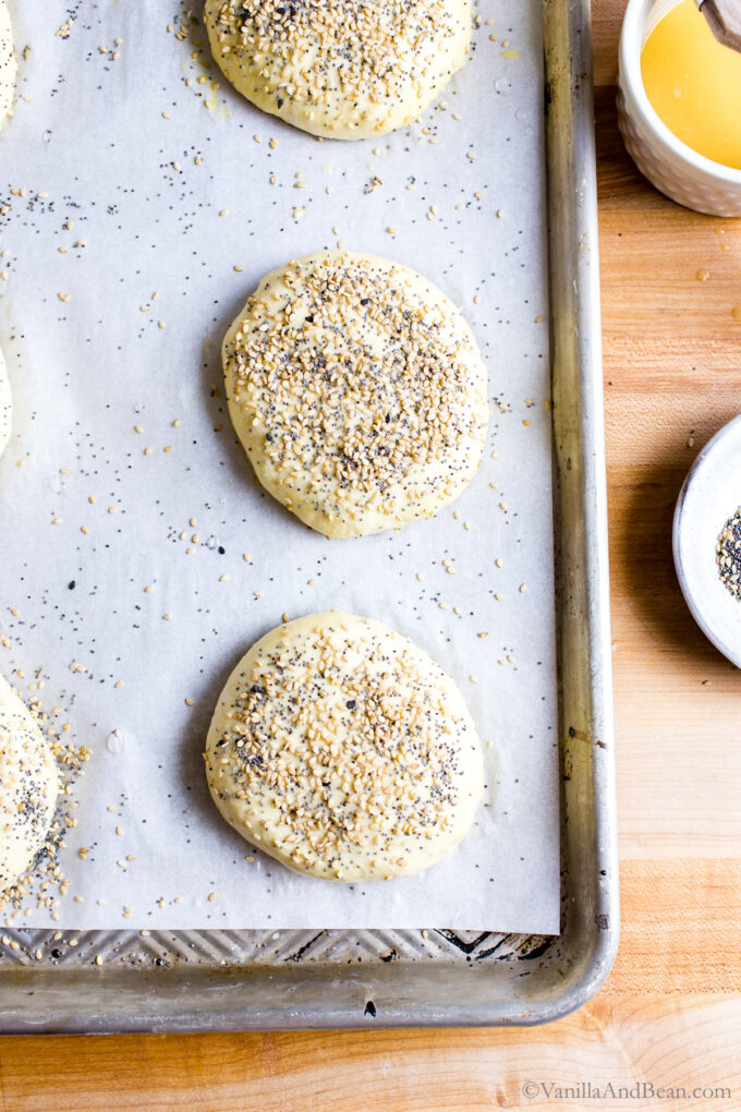 Sesame and poppy seeds sprinkled on top of the dough.