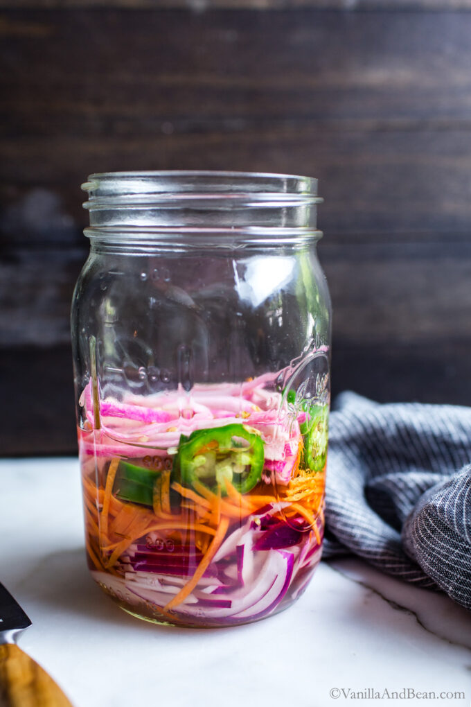 Quick pickled veggies in a Mason jar.