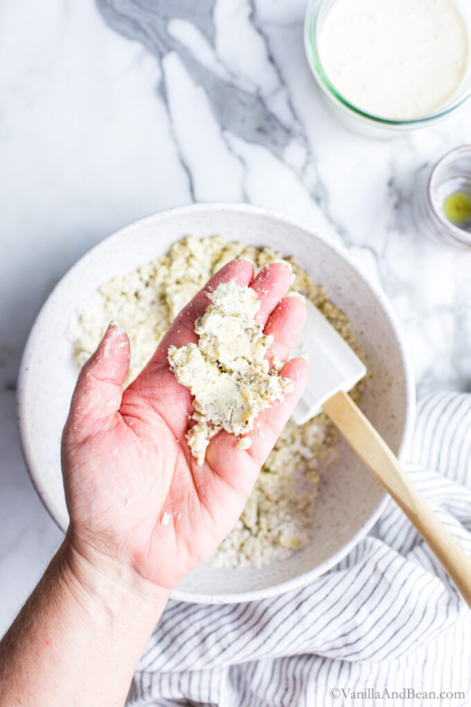 Cracker dough in palm of hand.