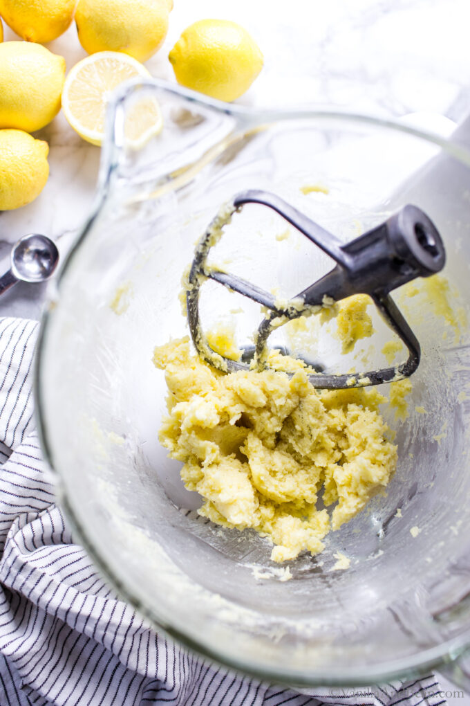 Lemon shortbread ingredients in the bowl of a stand mixer.