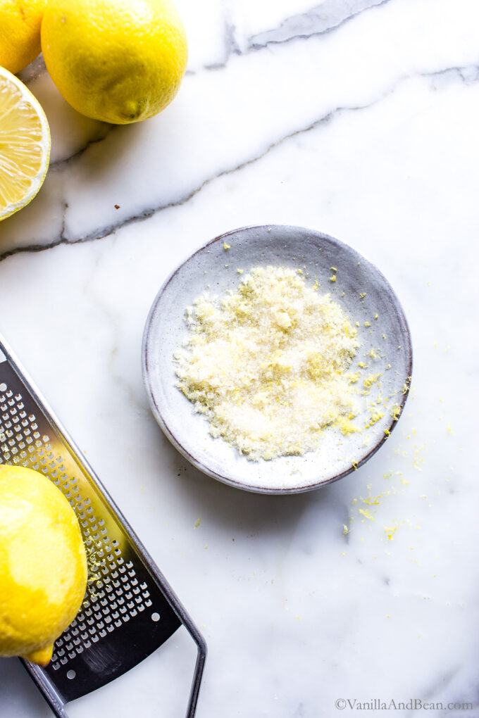 Lemon zest and sugar mixed together in a small bowl.