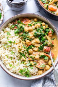 Spinach and Chickpea Curry with Coconut Milk in a bowl with basmati rice.