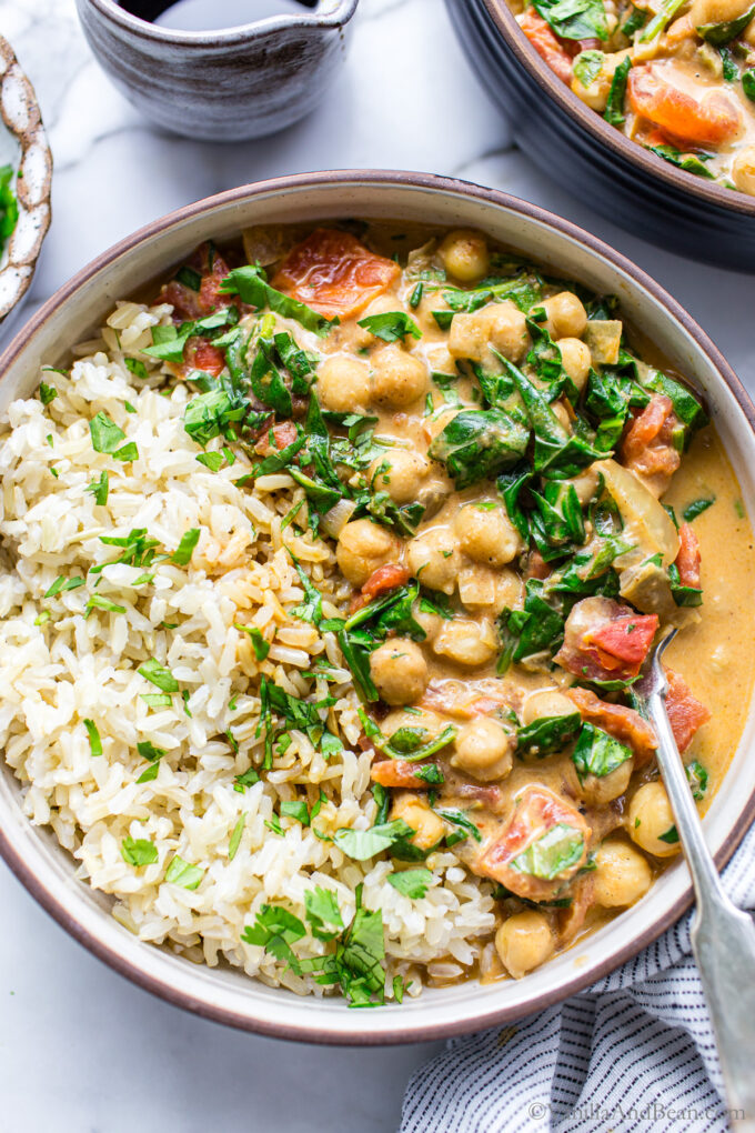 Spinach and Chickpea Curry with Coconut Milk in a bowl with basmati rice.