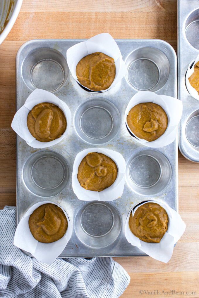 Sourdough discard pumpkin muffins in tulip cups.