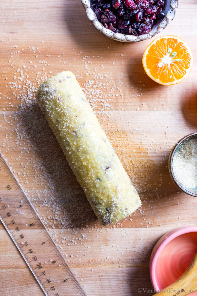 Egg washed and sprinkled cookie dough log.