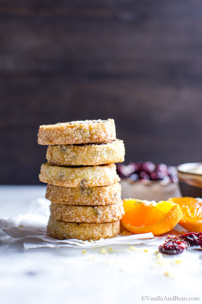Stacked cranberry orange cookies.